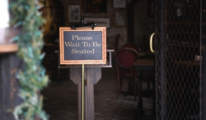 Please Wait To Be Seated Sign